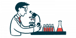 A scientist working in a lab looks at a slide using a microscope.