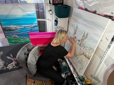 paintings | Charcot-Marie-Tooth News | Karina Vaile demonstrates how she holds a paintbrush