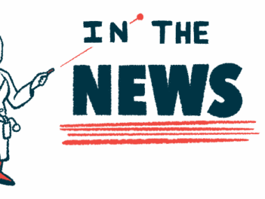 A person in a lab coat uses a laser to point at the words 